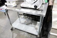 4FT STAINLESS STEEL TABLE ON CASTERS