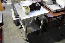 30X24 STAINLESS STEEL TABLE ON CASTERS