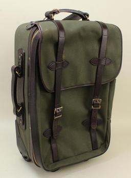 1 new Filson medium rolling carry-on bag.