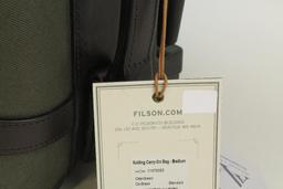 1 new Filson medium rolling carry-on bag.