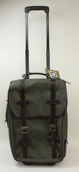 1 new Filson medium rolling carry-on bag.