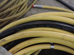 100' 10,500 PSI hydrolic hose and a 50' hydrolic hose.