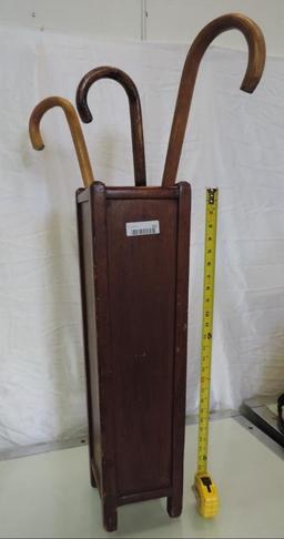 3 canes with solid wood umbrella/cane holder.
