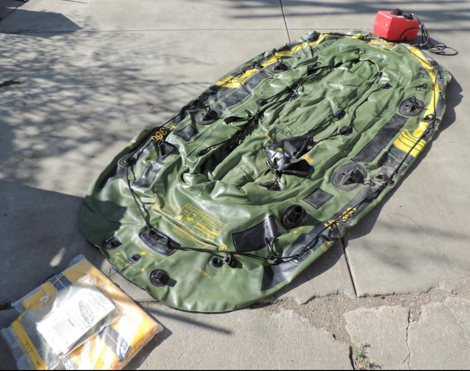 Sevylor Fish hunter 360 Inflatable raft with manual and Tempo boat gas tank.