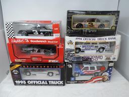 6 1/24th scale diecast cars.