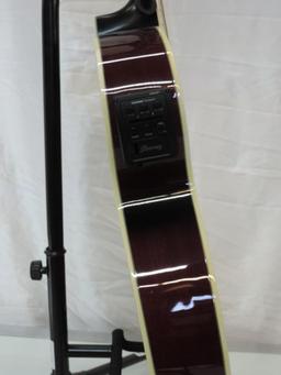 Ibanez AEG20II-TRS-3R-01 acoustic / electric guitar with cord and stand.