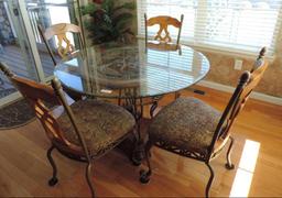 Glass top Table with 4 chairs.