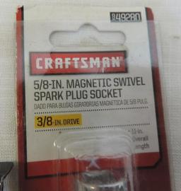 Craftsman dog bone wrench and spark plug socket.