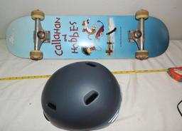 Glass House skateboard with size large Giro helmet.
