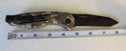 SOG Aegis Tanto camo knife.