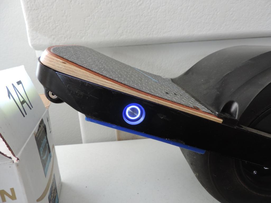 High $ Onewheel + skateboard with accessories.