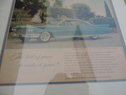 Framed Cadilac print.