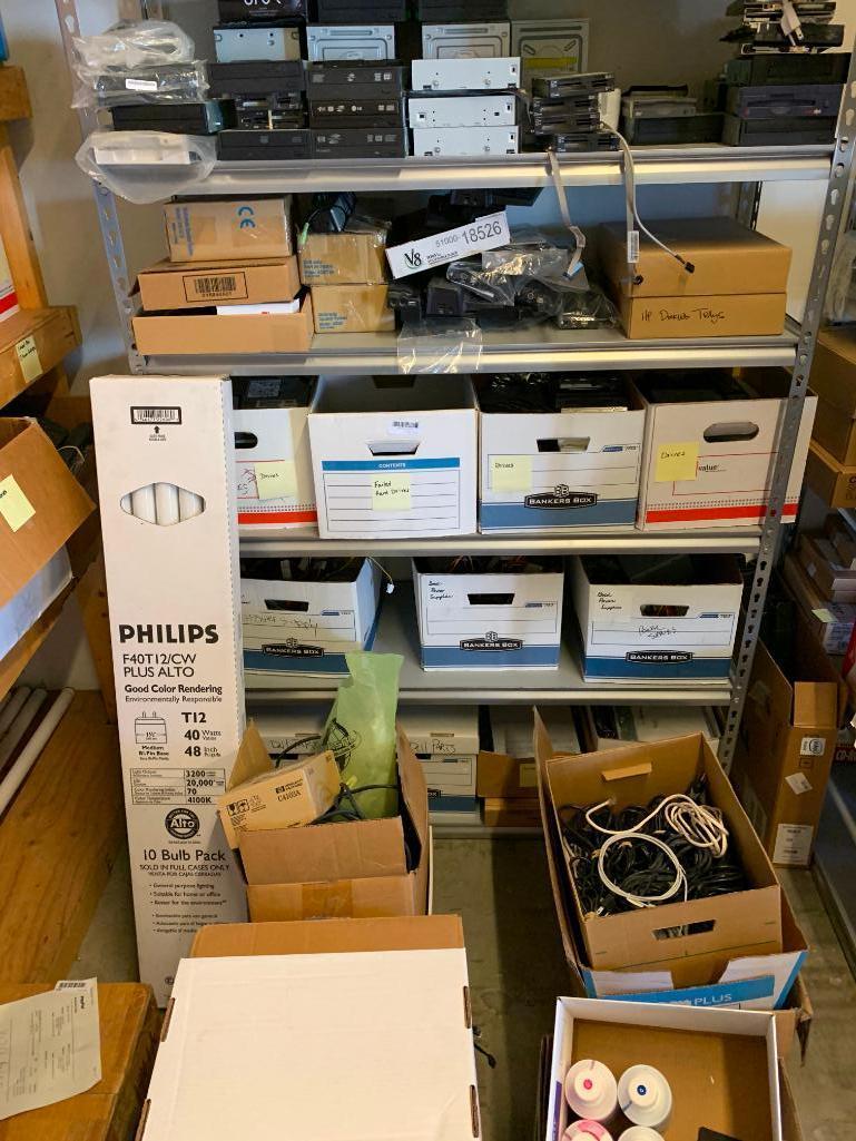 Contents of shelving back room-Cables, failed drives, cd drives, power supplies, computer parts,