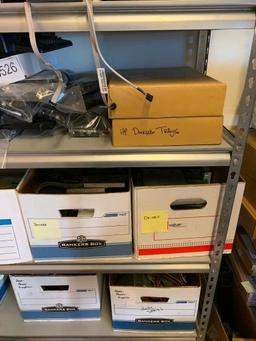 Contents of shelving back room-Cables, failed drives, cd drives, power supplies, computer parts,