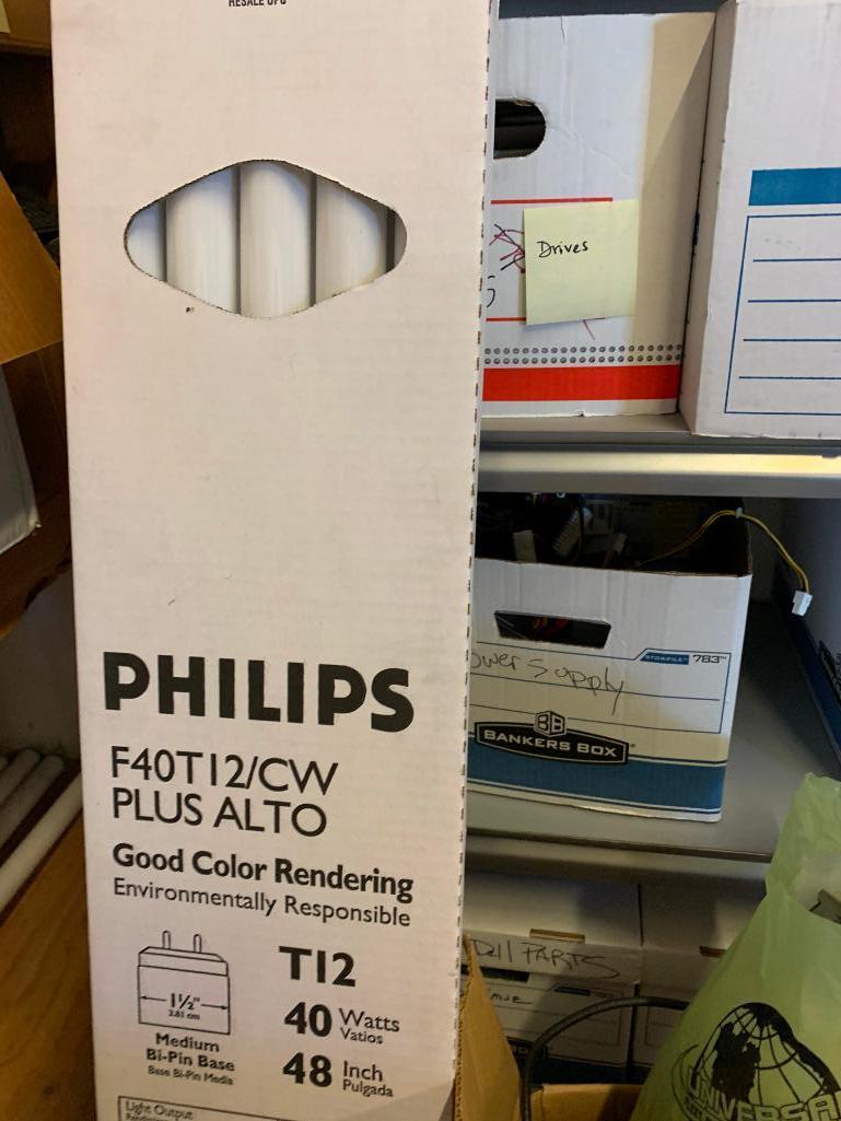 Contents of shelving back room-Cables, failed drives, cd drives, power supplies, computer parts,
