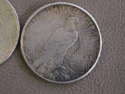 Three 1922 Peace dollar coins