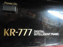 Roland KR-777 digital intelligent piano.