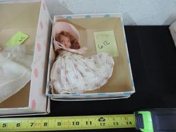 Two madam Alexander dolls.