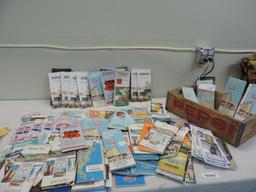 Over 120 vintage gas station road maps with Pepsi crate.
