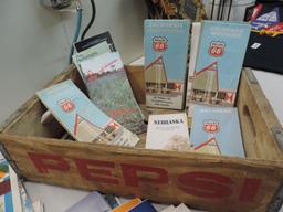 Over 120 vintage gas station road maps with Pepsi crate.