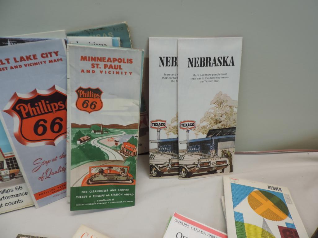 Over 120 vintage gas station road maps with Pepsi crate.