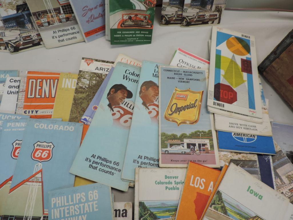 Over 120 vintage gas station road maps with Pepsi crate.