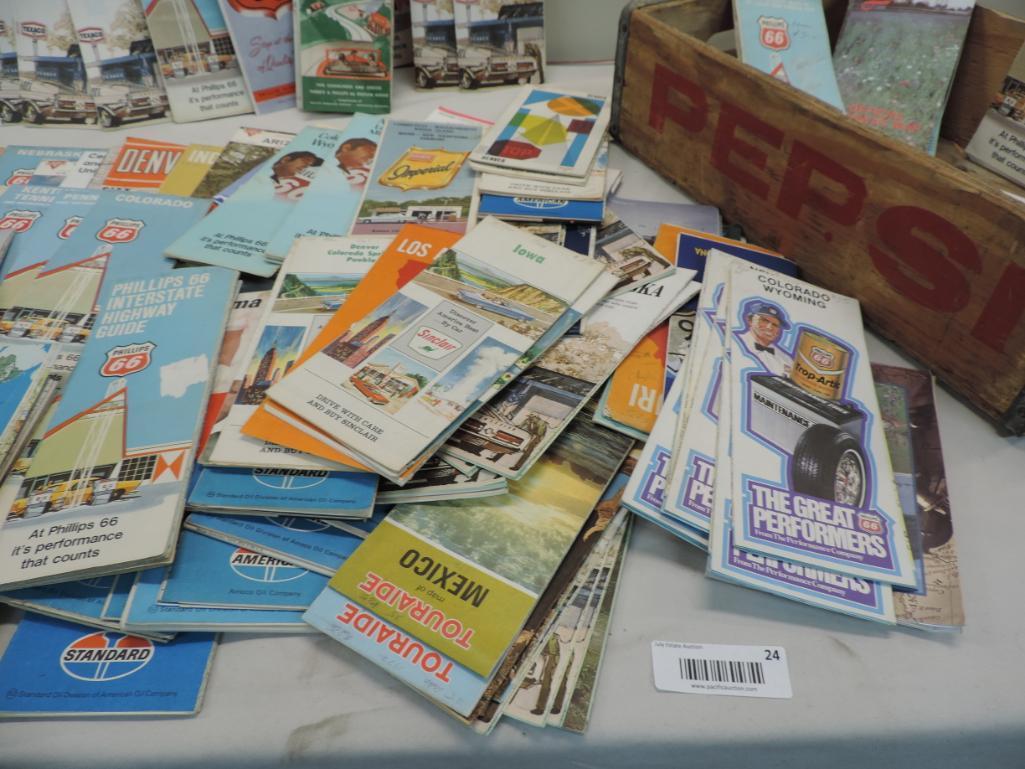 Over 120 vintage gas station road maps with Pepsi crate.