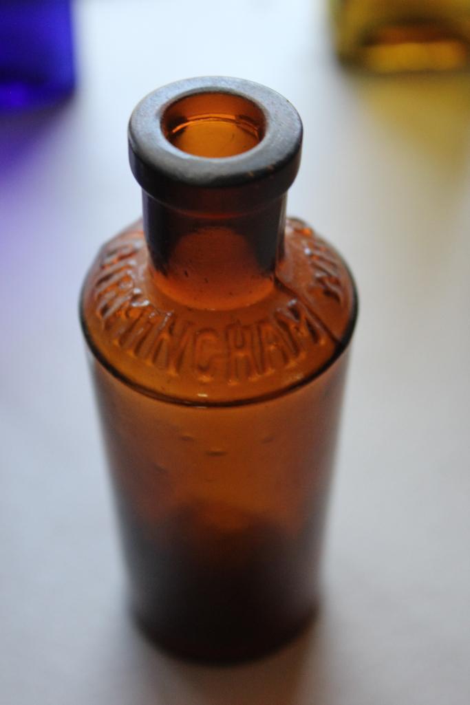 12 Small Antique Bottles Including Poison Bottles