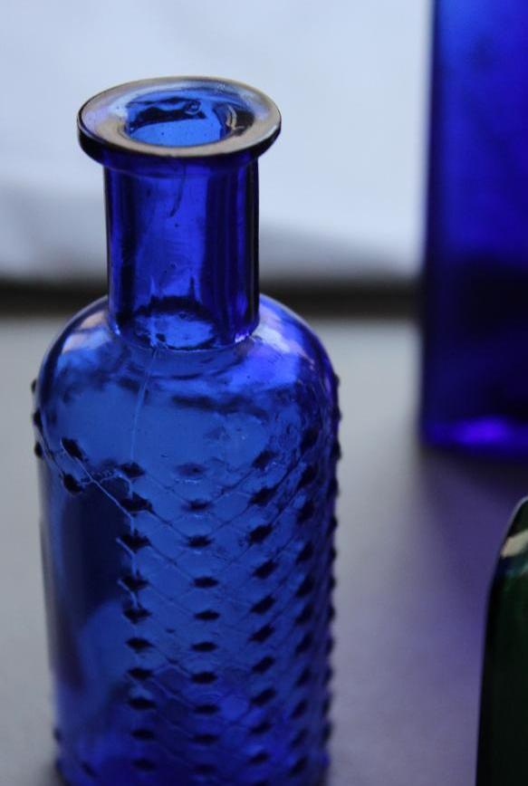 12 Small Antique Bottles Including Poison Bottles