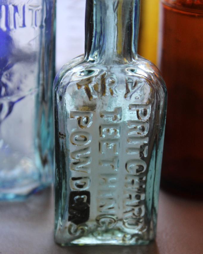 12 Small Antique Bottles Including Poison Bottles