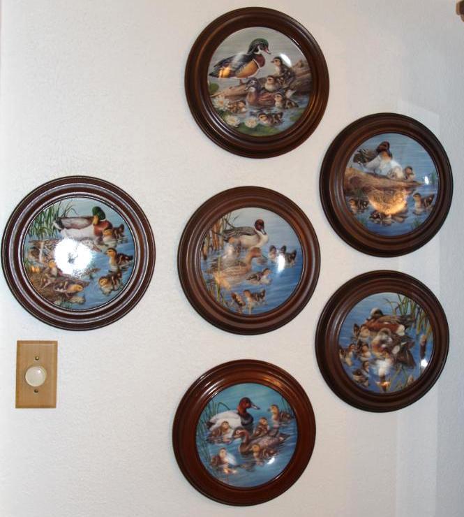 Six Wood-Framed Collector Plates by Knowles with COA