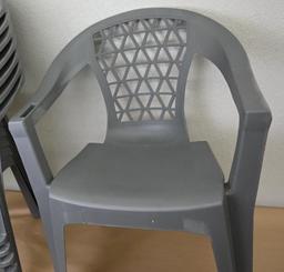 Eight Gray Stacking Plastic Chairs