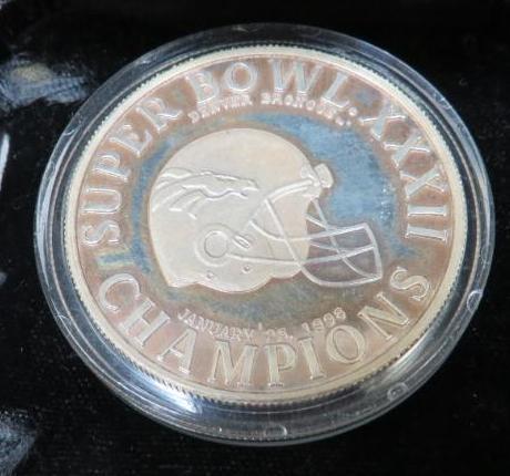 Two 1988 Superbowl XXXII Denver Broncos Coins