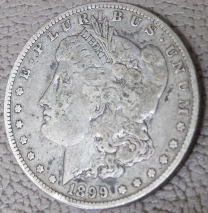 Two 1899 "O" Morgan Silver Dollar Coins