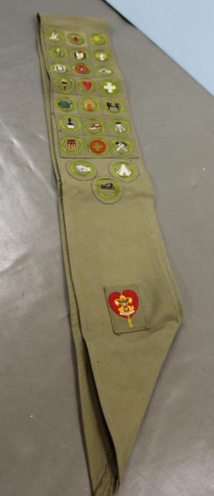 Older Sash With Many Merit Badges