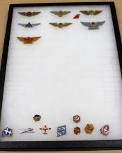 Mixed Airline and Snow Birds Pins in Display Case