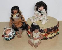 Three Small Indigenous-Style Porcelain Dolls and Accessories