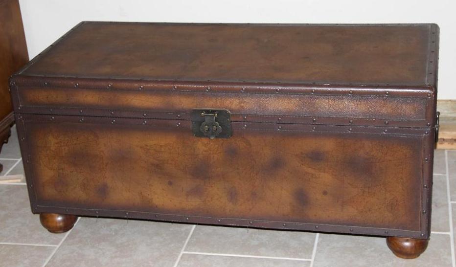 Large Brown Trunk with Blankets and Partial Sheepskin
