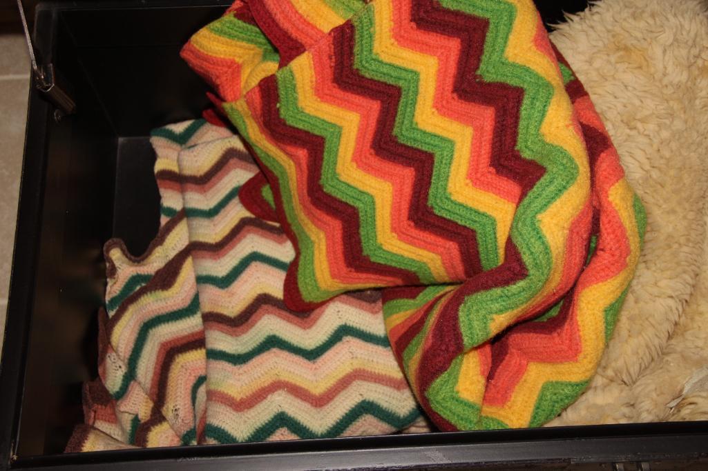 Large Brown Trunk with Blankets and Partial Sheepskin