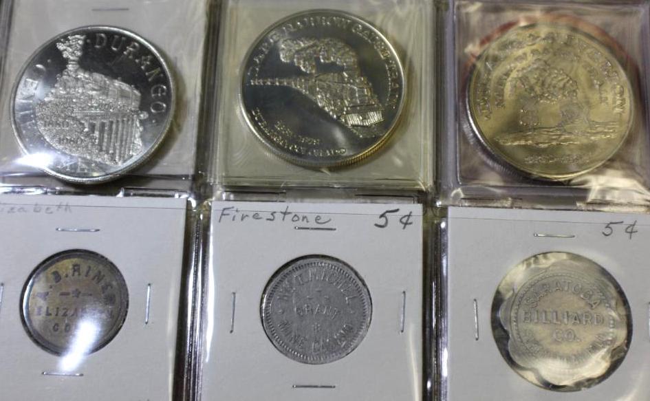Binder Filled with Collectible Colorado Trade Tokens and Guide Book