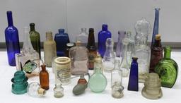 Mixed Clear and Colorful Glass Bottles, Insulators, and More