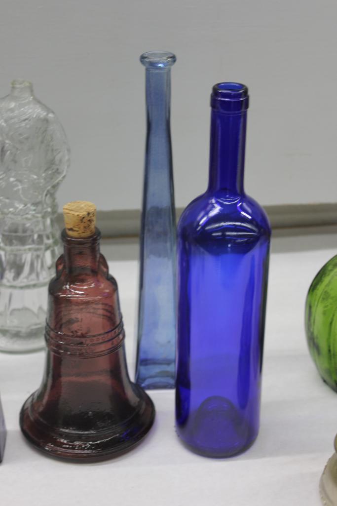 Mixed Clear and Colorful Glass Bottles, Insulators, and More