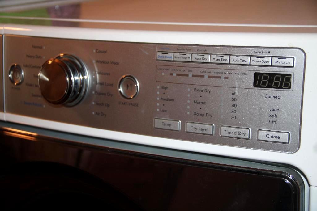 Front-Opening LG Washer and Kenmore Dryer on Stand Bases