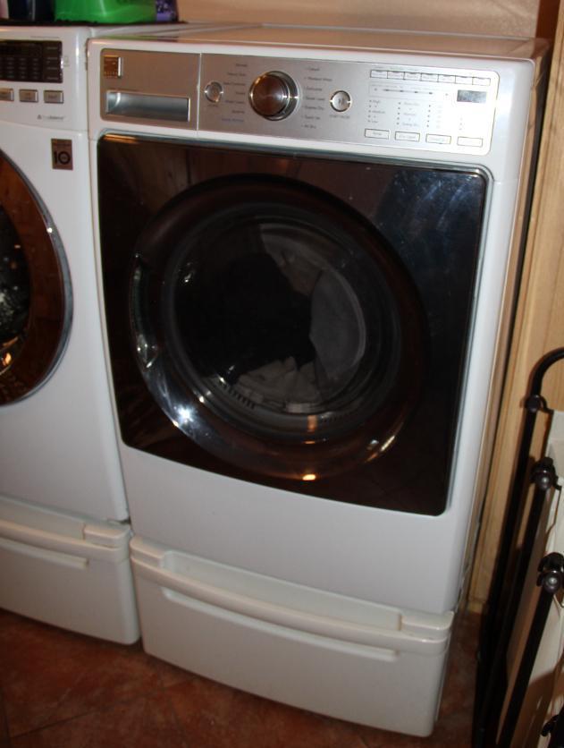 Front-Opening LG Washer and Kenmore Dryer on Stand Bases