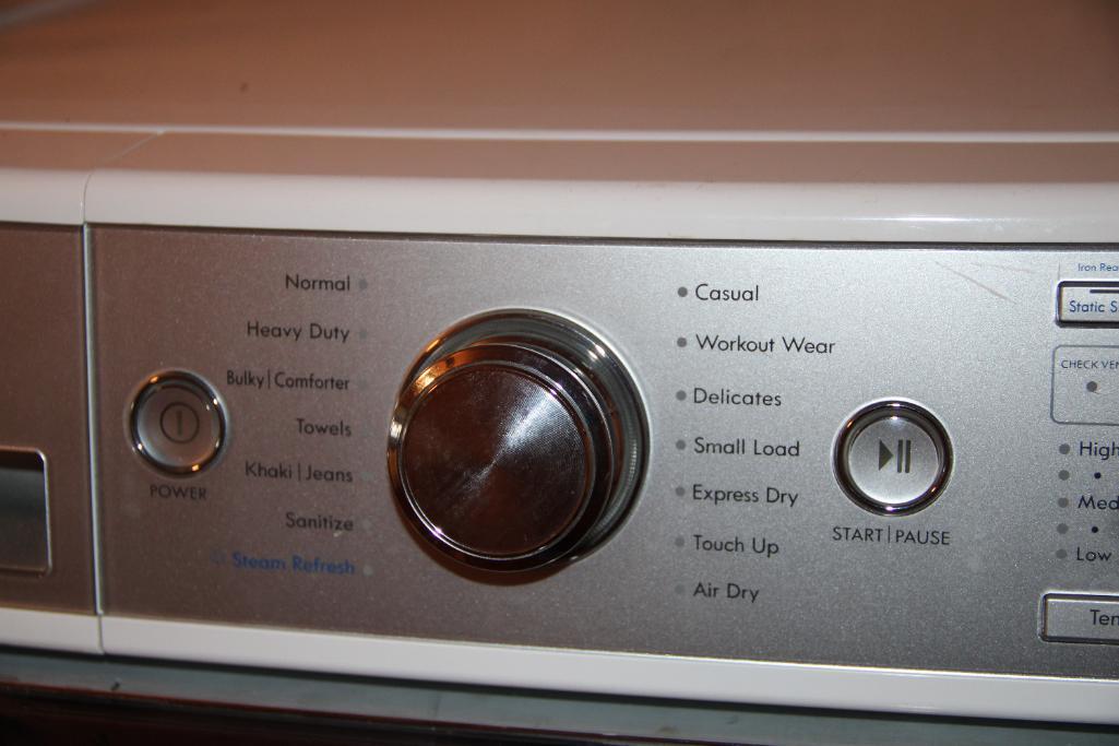 Front-Opening LG Washer and Kenmore Dryer on Stand Bases