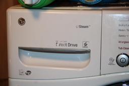 Front-Opening LG Washer and Kenmore Dryer on Stand Bases