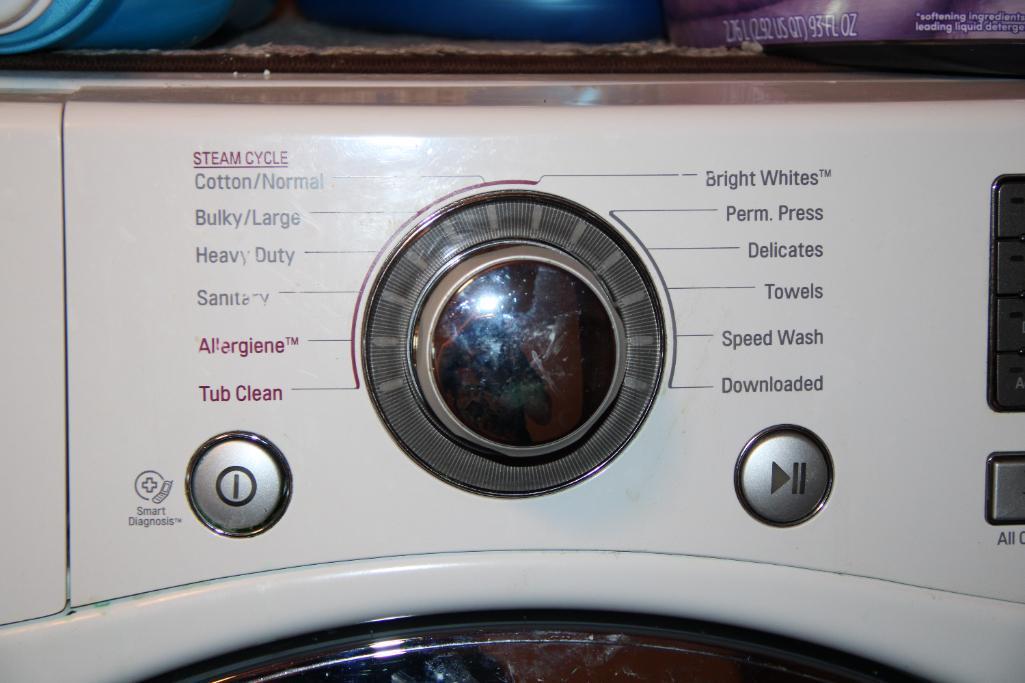 Front-Opening LG Washer and Kenmore Dryer on Stand Bases