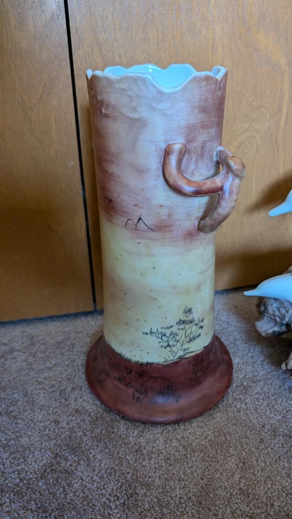 Dolphin with Calf by John Perry and African Vase