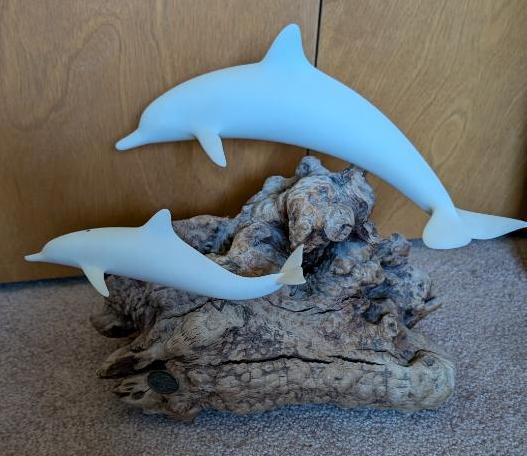 Dolphin with Calf by John Perry and African Vase