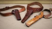 Leather Holsters with Ammo Belts and One Sling